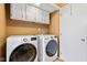 Functional laundry room with modern LG washer and dryer units for efficient chore completion at 582 Conner Creek Dr, Fishers, IN 46038