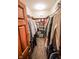Walk-in closet featuring wood shelving and ample space for storage at 5851 Beisinger Pl, Indianapolis, IN 46237