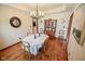 Dining room showcasing hardwood floors and traditional style at 5851 Beisinger Pl, Indianapolis, IN 46237