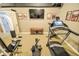 Basement gym featuring exercise equipment including a treadmill and weight machine at 5851 Beisinger Pl, Indianapolis, IN 46237