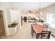 Open concept kitchen featuring white cabinets, and tile flooring at 5851 Beisinger Pl, Indianapolis, IN 46237