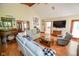 Spacious living room featuring hardwood floors and ample seating at 5851 Beisinger Pl, Indianapolis, IN 46237
