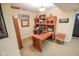 Office featuring a large desk, hutch, leather chair, and Purdue decor at 5851 Beisinger Pl, Indianapolis, IN 46237