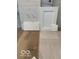Samples of hardwood flooring, white subway tile, and modern trim options, perfect for creating a stylish interior design at 588 Bluestem Ln, New Whiteland, IN 46184
