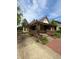 Charming home featuring a welcoming brick porch and well-maintained landscaping at 593 S 10Th S St, Noblesville, IN 46060