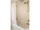 Bathroom featuring a white subway tile wall, shower curtain and stainless steel shower head at 6137 Evanston Ave, Indianapolis, IN 46220