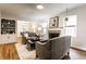 Comfortable living room with a fireplace, hardwood floors, and stylish furnishings at 6137 Evanston Ave, Indianapolis, IN 46220