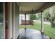 Inviting covered porch with a swing, perfect for relaxing outdoors at 6159 Broadway St, Indianapolis, IN 46220