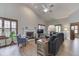 Comfortable living room with a fireplace, natural light, and a vaulted ceiling at 6503 E Walton Dr, Camby, IN 46113