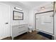Bathroom with a sink and mirror as well as glass enclosed shower at 6673 Karyn Dr, Avon, IN 46123