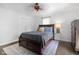 Bedroom with a dark wood bed frame, hardwood floors and light gray paint at 6673 Karyn Dr, Avon, IN 46123