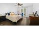 Bedroom features a ceiling fan, a window and a blue chair at 6673 Karyn Dr, Avon, IN 46123