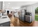 Bright kitchen with stainless steel appliances and white cabinets, perfect for cooking and entertaining at 6673 Karyn Dr, Avon, IN 46123