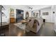 Comfortable living room featuring a stone fireplace, hardwood floors, and comfortable seating at 6673 Karyn Dr, Avon, IN 46123