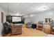 Finished basement featuring a home theater setup with comfortable seating and a wine storage area at 6825 Farmleigh Dr, Indianapolis, IN 46220