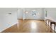 Hardwood floors and lots of natural light make this living room inviting and warm at 6825 Farmleigh Dr, Indianapolis, IN 46220