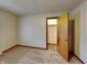 Comfortable bedroom with neutral walls, carpet flooring, and closet at 6985 E County 100 S Rd, Avon, IN 46123
