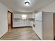 Well-lit kitchen featuring white appliances, cabinetry, and a window over the sink at 6985 E County 100 S Rd, Avon, IN 46123