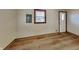 Cozy living room with a window and wood-look flooring at 6985 E County 100 S Rd, Avon, IN 46123