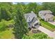 Aerial view of a beautiful home with a manicured lawn and lush landscaping at 7388 Wythe Dr, Noblesville, IN 46062
