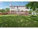 Expansive backyard with a wooden deck, perfect for outdoor entertaining and relaxation at 7388 Wythe Dr, Noblesville, IN 46062
