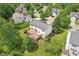 Expansive backyard featuring a spacious deck, lush landscaping, and mature trees, perfect for outdoor entertaining and relaxation at 7388 Wythe Dr, Noblesville, IN 46062