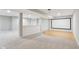 Spacious basement featuring neutral walls and carpet with a projection screen at 7388 Wythe Dr, Noblesville, IN 46062