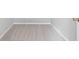 A light-colored empty closet with neutral carpet and a white wire shelf at 7388 Wythe Dr, Noblesville, IN 46062