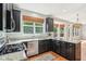 Kitchen features stainless steel appliances, granite countertops, and dark cabinets at 7388 Wythe Dr, Noblesville, IN 46062
