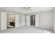 Spacious main bedroom with carpet and doors leading to the bathroom and closet at 7388 Wythe Dr, Noblesville, IN 46062