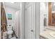 Bathroom features a toilet, shower with curtain, and decorative towel rack at 745 N Madison St, Fortville, IN 46040