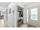Well-organized entryway with a built-in bench, coat rack, and stylish decor for a welcoming first impression at 745 N Madison St, Fortville, IN 46040