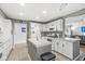 A kitchen with an island, tile countertops, and white appliances at 745 N Madison St, Fortville, IN 46040