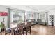 Open-concept living and dining area with stylish furnishings and ample natural light, perfect for modern living at 745 N Madison St, Fortville, IN 46040