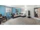Relaxing living room with comfortable seating, soft lighting and accent wall at 745 N Madison St, Fortville, IN 46040