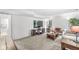 Finished basement features a large TV, seating area and a walkout to the backyard at 8047 Van Ness Way, Indianapolis, IN 46240