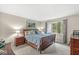 Inviting bedroom with a relaxing ambiance, featuring natural light and tasteful decor at 8047 Van Ness Way, Indianapolis, IN 46240