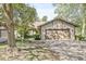 Charming exterior view features a two-car garage, attractive siding, and a well-manicured lawn at 8047 Van Ness Way, Indianapolis, IN 46240