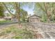 Charming exterior view features a two-car garage, attractive siding, and a well-manicured lawn at 8047 Van Ness Way, Indianapolis, IN 46240