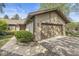 Charming exterior view features a two-car garage, attractive siding, and a well-manicured lawn at 8047 Van Ness Way, Indianapolis, IN 46240