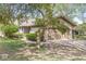Charming exterior view features a two-car garage, attractive siding, and a well-manicured lawn at 8047 Van Ness Way, Indianapolis, IN 46240