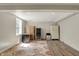 Basement area featuring a colorful rug, storage cabinet and wine cooler at 8820 Mud Creek Rd, Indianapolis, IN 46256