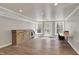Spacious basement featuring wood-look floors, recessed lighting, and stylish storage at 8820 Mud Creek Rd, Indianapolis, IN 46256