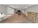 Spacious finished basement with wood-look floors and ample room for entertaining at 8820 Mud Creek Rd, Indianapolis, IN 46256