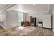 Basement area featuring a colorful rug, storage cabinet and wine cooler at 8820 Mud Creek Rd, Indianapolis, IN 46256