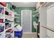 Walk-in closet features ample shelving and storage space, offering an organized and functional design at 8820 Mud Creek Rd, Indianapolis, IN 46256