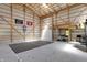 Spacious garage interior with high ceilings and basketball hoop at 8820 Mud Creek Rd, Indianapolis, IN 46256