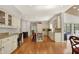 Spacious kitchen boasting ample cabinet space, stainless steel appliances, and hardwood floors at 8820 Mud Creek Rd, Indianapolis, IN 46256