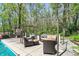 Relaxing outdoor patio with comfortable seating, perfect for entertaining and enjoying the serene backyard at 8820 Mud Creek Rd, Indianapolis, IN 46256