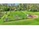 Expansive yard with fencing, well-maintained lawn, and outdoor features for potential buyers seeking space and functionality at 8820 Mud Creek Rd, Indianapolis, IN 46256